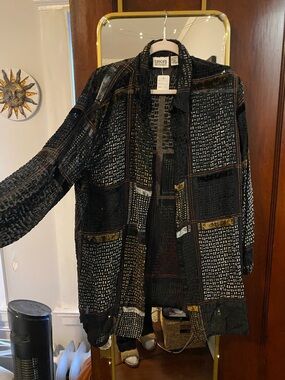 Black Patchwork Textured Coat with Subtle Metallic Accents